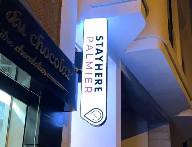 Enseigne drapeau lumineuse Stayhere Palmier